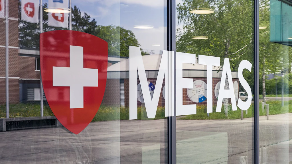 Signage on the main METAS building. The METAS logo is displayed on the windows.